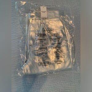 Brand new silver vegan leather jeans by Abercrombie & Fitch.